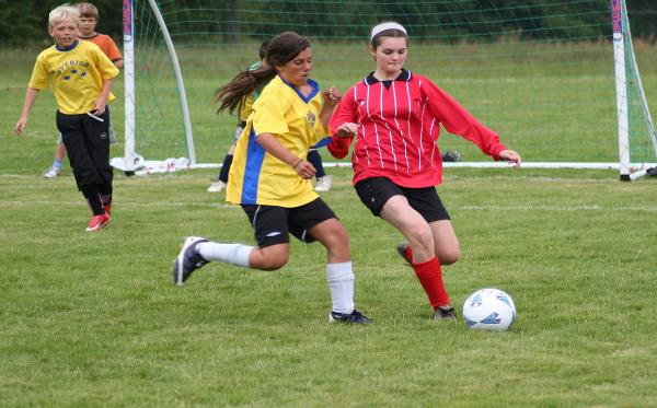 Girls playing soccer